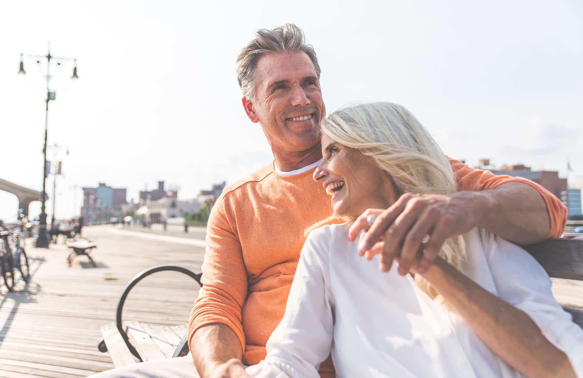 People at the beach in GA with dental implants.