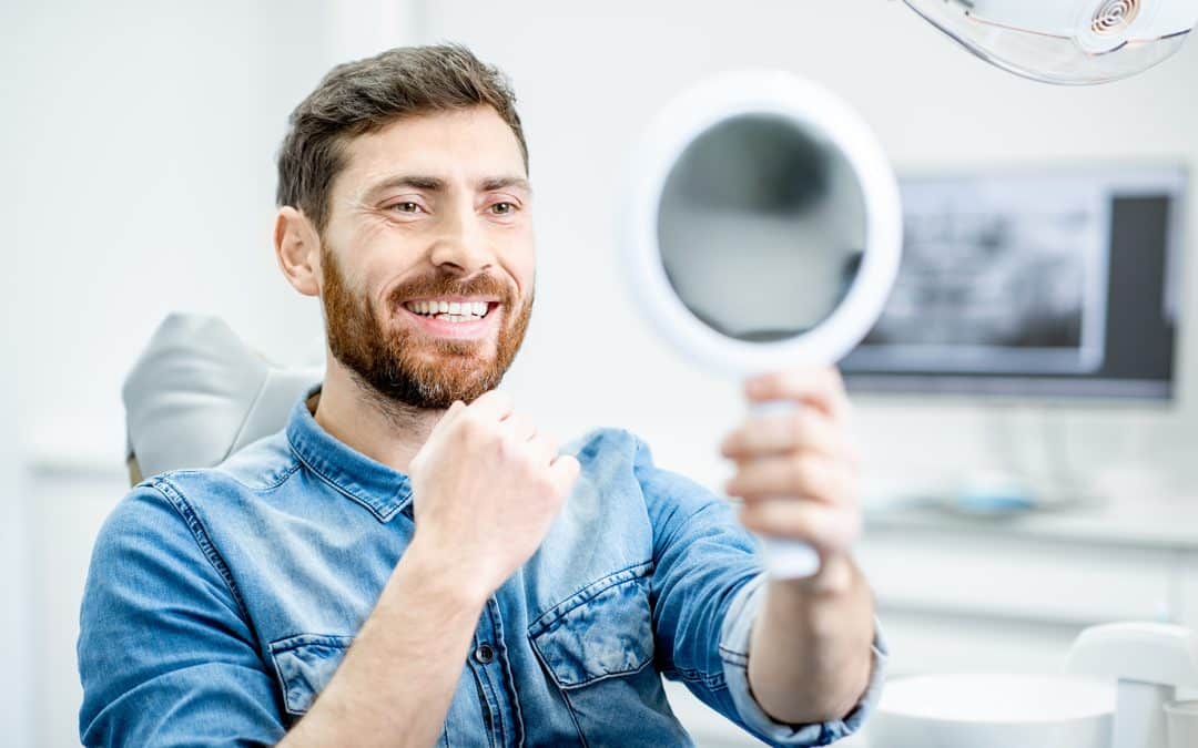 man smiling during a Botox and dermal fillers dental appointment with Dr. Misty M. Seale at iHeart Dental